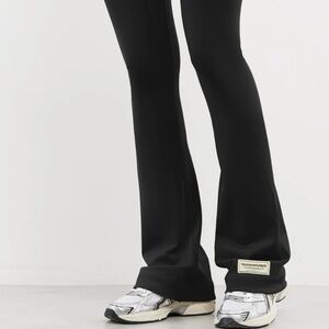 The giving movement Black Flare cargo Pants